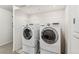 Modern laundry area showcasing front-loading LG washer and dryer at 1663 W 135Th Way, Denver, CO 80234