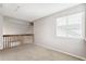 Loft area featuring neutral carpet, white walls and a window with blinds at 1663 W 135Th Way, Denver, CO 80234