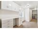 Office with a desk, built in cabinets, and carpet flooring at 1663 W 135Th Way, Denver, CO 80234