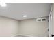 Unfurnished basement room, carpeted with a small window, suitable for a bedroom or office at 7496 Clay St, Westminster, CO 80030