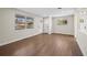 Bright living room featuring hardwood floors, fresh white trim, and natural light at 7496 Clay St, Westminster, CO 80030