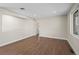 Spacious living room featuring hardwood floors, fresh white trim, and natural light at 7496 Clay St, Westminster, CO 80030