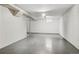 Unfinished basement with concrete floor and utility access at 7412 W 76Th Ave, Arvada, CO 80003