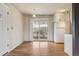 Dining area with sliding glass doors and hardwood floors at 7412 W 76Th Ave, Arvada, CO 80003