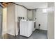 Basement laundry room with washer and dryer at 7412 W 76Th Ave, Arvada, CO 80003