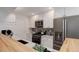 Well-appointed kitchen with stainless appliances, granite counters, and ample cabinet space at 9172 W 88Th Cir, Westminster, CO 80021