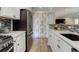 Bright kitchen featuring stainless steel appliances, plenty of counter space, and modern finishes at 9172 W 88Th Cir, Westminster, CO 80021