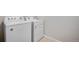 Laundry room featuring a white washer and dryer at 16794 W 94Th Way, Arvada, CO 80007