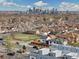Elevated view showcasing the home's location with the Denver skyline in the distance at 3101 W 47Th Ave # 14, Denver, CO 80211
