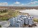 An aerial view of the complex with a lake and park nearby at 3101 W 47Th Ave # 14, Denver, CO 80211