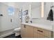 Sleek bathroom featuring a glass-enclosed shower, floating vanity, and modern fixtures at 3101 W 47Th Ave # 14, Denver, CO 80211