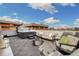 Relaxing rooftop deck featuring a hot tub, fire pit, and comfortable seating for outdoor living at 3101 W 47Th Ave # 14, Denver, CO 80211