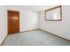 Cozy bedroom featuring carpeted floors, a window offering natural light and closet access at 9125 Lowell Ct, Westminster, CO 80031