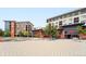 Modern apartment buildings with outdoor seating, landscaping, and a vibrant commercial space offer a lively community atmosphere at 9125 Lowell Ct, Westminster, CO 80031