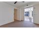 Bright bedroom with windows offering city views, and doorway leading to living area at 1750 Wewatta St # 1102, Denver, CO 80202