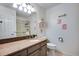 Well-lit bathroom with a modern sink, granite countertop, and tiled backsplash at 9980 Newton Ct, Westminster, CO 80031
