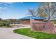 Welcoming park entrance with lush greenery and informative signage to community recreation area at 9980 Newton Ct, Westminster, CO 80031