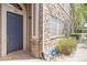 Inviting front door with stone accents and a welcome mat, protected by ADT security systems at 4222 S Blackhawk Cir # 6C, Aurora, CO 80014