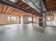 Spacious unfinished basement with visible ceiling beams and potential for customization at 902 Anaconda Ct, Castle Rock, CO 80108