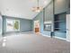 Stylish bedroom with high ceilings, a ceiling fan, fireplace, and plenty of natural light at 902 Anaconda Ct, Castle Rock, CO 80108