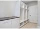 Mud room equipped with custom cubbies and storage, perfect for organization at 902 Anaconda Ct, Castle Rock, CO 80108