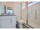 Bright bathroom features a glass-enclosed shower, modern vanity, and sleek finishes at 1998 Foxtail Ln # B, Lafayette, CO 80026