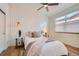 Comfortable bedroom with natural light features modern decor and a cozy atmosphere at 1998 Foxtail Ln # B, Lafayette, CO 80026