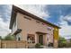Contemporary two-story home featuring modern siding, large windows, and a neatly landscaped front yard at 1998 Foxtail Ln # B, Lafayette, CO 80026