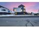 Striking contemporary home with clean lines, modern design, and vibrant twilight sky at 10193 W 38Th Ave, Wheat Ridge, CO 80033