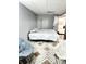 Bedroom featuring tile floors and access to an adjacent room at 20308 E 48Th Dr, Denver, CO 80249