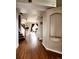 Elegant foyer with hardwood floors, leading to staircase and open-concept living spaces at 20308 E 48Th Dr, Denver, CO 80249