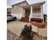 Charming two-story home with landscaped yard and a cozy front porch at 20308 E 48Th Dr, Denver, CO 80249