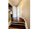 Upstairs hallway with hardwood floors leading to the bedrooms at 20308 E 48Th Dr, Denver, CO 80249