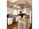 Modern kitchen with granite countertops, stainless steel appliances, and ample cabinet space at 20308 E 48Th Dr, Denver, CO 80249