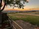 Picturesque backyard view at sunset, showcasing the perfect blend of nature and tranquility at 3691 Bucknell Dr, Highlands Ranch, CO 80129