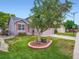 Attractive home exterior featuring mature landscaping and healthy green lawn at 3691 Bucknell Dr, Highlands Ranch, CO 80129