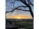Scenic mountain view at sunrise with deck and outdoor furniture, offering a great spot for outdoor enjoyment at 3691 Bucknell Dr, Highlands Ranch, CO 80129