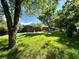 Expansive backyard with mature trees offering plenty of space for outdoor activities and relaxation at 10425 Franklin Way, Northglenn, CO 80233