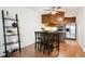 Well-equipped kitchen with wood cabinets and stainless steel appliances at 3465 S Poplar St # 406, Denver, CO 80224