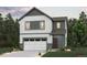 Charming two-story home with a two-car garage, professionally landscaped front yard and modern architecture at 19038 E 94Th Pl, Commerce City, CO 80022