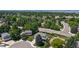 Scenic aerial view of a lush residential neighborhood with mature trees, well-maintained lawns, and charming homes at 7865 S Lafayette Ct, Centennial, CO 80122
