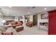 Spacious finished basement with a comfortable seating area and game area at 7865 S Lafayette Ct, Centennial, CO 80122