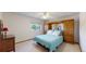 Bright and airy bedroom with a comfortable bed, a ceiling fan, and plenty of closet space at 7865 S Lafayette Ct, Centennial, CO 80122