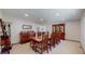 Formal dining room with a large wooden table and elegant furniture, perfect for gatherings at 7865 S Lafayette Ct, Centennial, CO 80122
