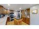 Charming kitchen with stainless steel appliances, hardwood floors, and a center island for meal prep at 7865 S Lafayette Ct, Centennial, CO 80122