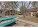 Well-maintained exterior featuring lush greenery and a inviting picnic area for residents at 1585 S Holly St # 109, Denver, CO 80222