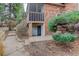 Exterior view of patio and stairs at 1585 S Holly St # 109, Denver, CO 80222