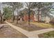 Well-kept townhome exterior with mature trees adding character and charm to the property at 1585 S Holly St # 109, Denver, CO 80222