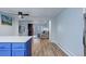 Open view from kitchen into living room featuring a fireplace and outdoor access at 1585 S Holly St # 109, Denver, CO 80222