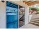 Covered patio with stairs at 1585 S Holly St # 109, Denver, CO 80222
